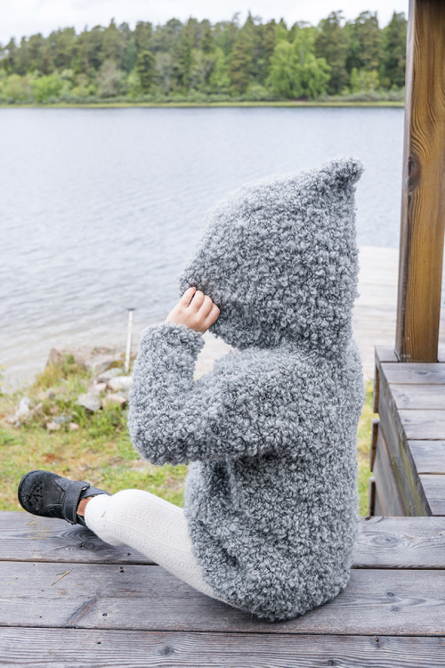 Lurvig jacka med huva till barn