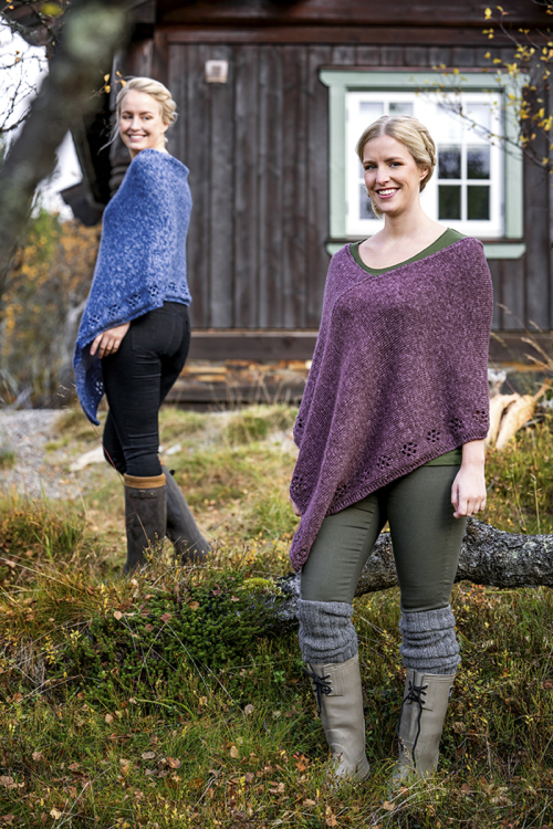 Flora Viola – poncho med blommönstrad bård